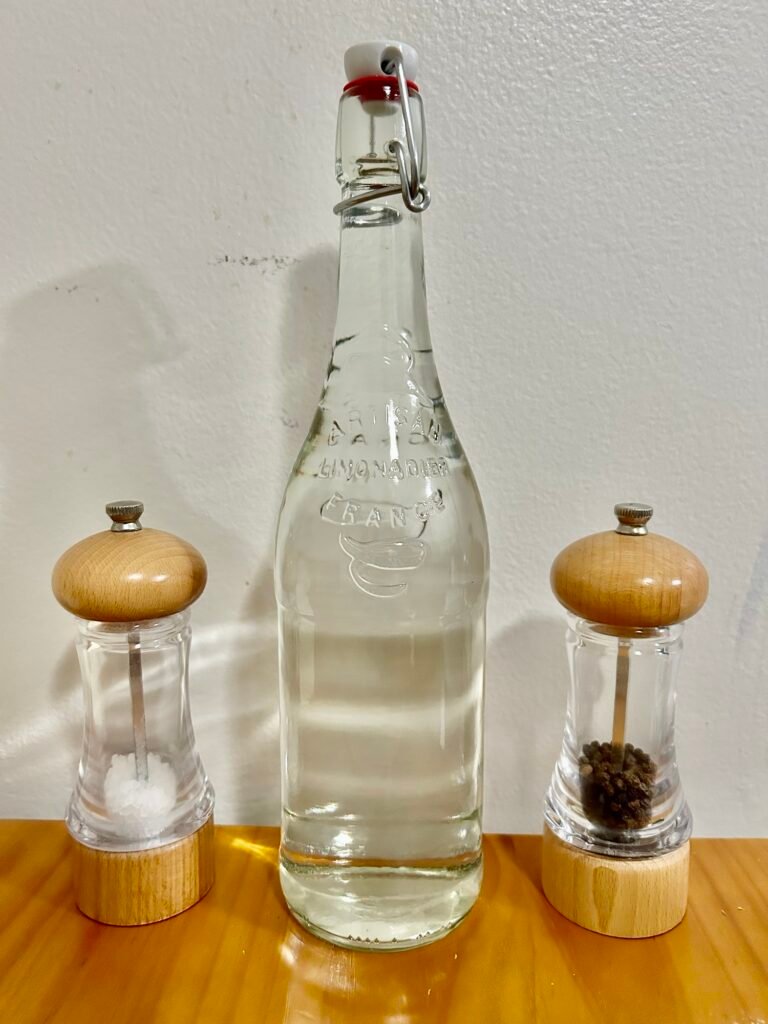 Glass water carafe on dinner table